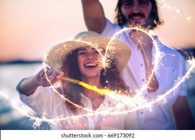 Young couple sharing happy  and love mood on the beach - Powered by Shutterstock