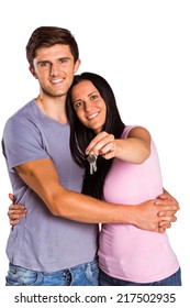 Young Couple Showing Keys To House On White Background