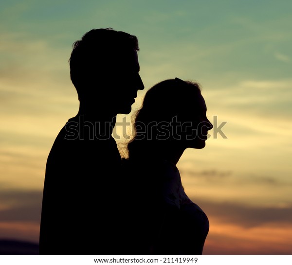 Young Couple Silhouettes Stock Photo (Edit Now) 211419949
