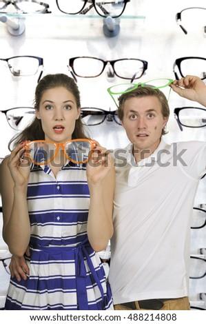 Young couple with silly goofy oversized glasses