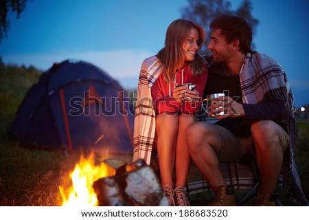 Similar – Image, Stock Photo People hiking at night. Mountains at sunrise. Man standing on peak. Natural mountain landscape with illuminated misty peaks, foggy slopes and valleys