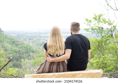 Young Couple Sitting Quietly Together Overlooking Stock Photo ...