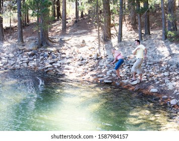 A Young Couple Skimming Stones