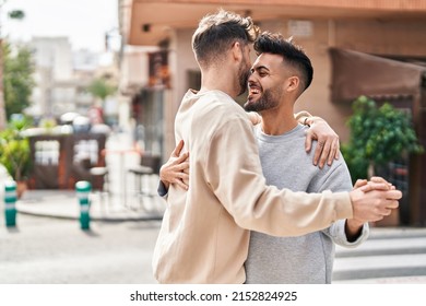 Young Couple Smiling Confident Dancing At Street