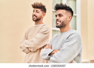 Young Couple Smiling Confident Standing With Arms Crossed Gesture At Street