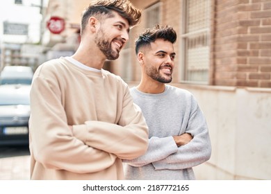 Young Couple Smiling Confident Standing With Arms Crossed Gesture At Street