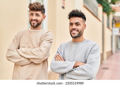 Young Couple Smiling Confident Standing With Arms Crossed Gesture At Street