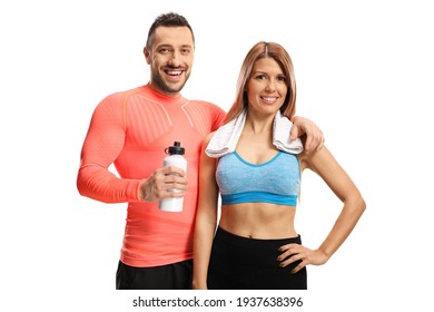 Young couple in sportswear posing after exercise isolated on white background