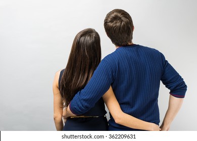  Young Couple Standing Back