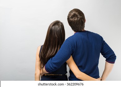  Young Couple Standing Back