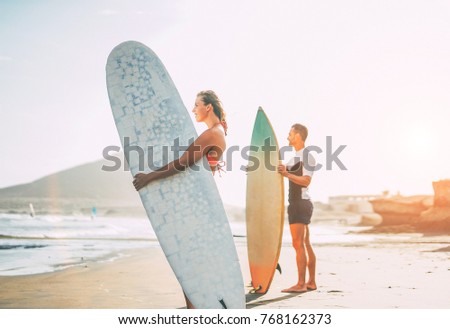 Similar – Beautiful women having fun in a surf class