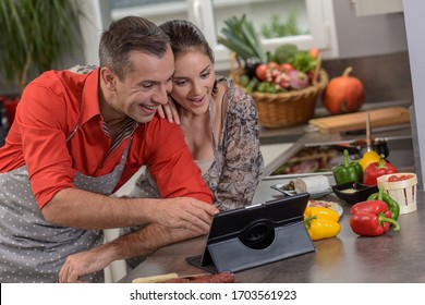 Young Couple Take An Online Cooking Class