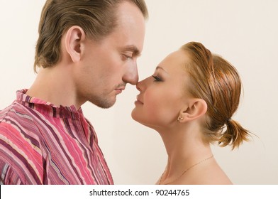 Young Couple Touching Noses - Eskimo Kiss