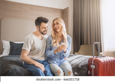 Young Couple Travel Together Hotel Room Leisure