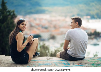 Young Couple Travelling And Visiting Europe.Summer Touring Europe And Mediterranean Culture.Colourful Streets,cityscape Sightseeing Tour.Budget Traveling And Exploring Concept.Travel Blogger