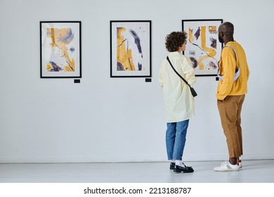 Young couple visiting art gallery - Shutterstock ID 2213188787
