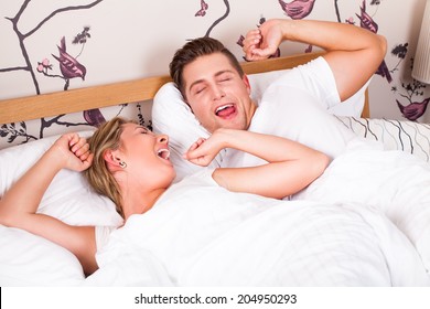 Young Couple Waking Up