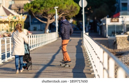 young couple walking on the pier - Powered by Shutterstock