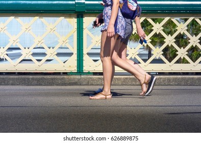 Young Couple Walking On Pyrmont Bridge , Sydney