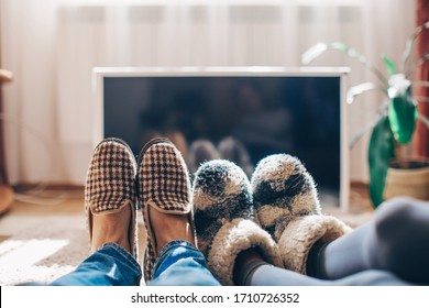 Young Couple Watching Tv At Home. Young Couple Waching Movie On Tv. Self Isolation At Home. Happy Day. People. Funny Photo. Married. Television. Man And Woman Home. Romantic Lovers. Lovely. Life. 
