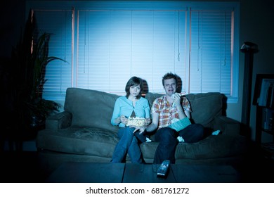 Young Couple Watching Tv, Man Crying