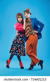 Young Couple Wearing Colorful Old-fashion Clothes In Pinup Style. They Can Represent Members Of A Youth Counterculture Stilyagi Existed From The Late 1940s Until The Early 1960s In The Soviet Union