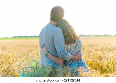 Young Couple In Wheat Field