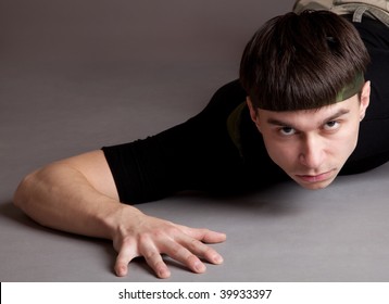 Young Crawling Man On Floor