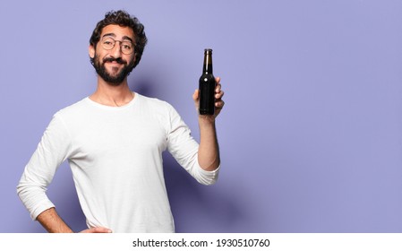 Young Crazy Bearded Man With A Beer