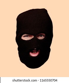 Young Crazy Bearded Man Cutout Head Expression Isolated. Criminal With Ski Mask Role. Angry Expression