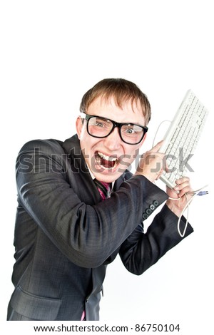 young crazy guy with a keyboard in hand, isolated over white