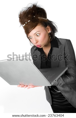 A young crazy lady with a computer on white background