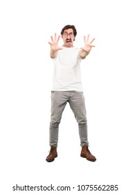 Young Crazy Man Scared Expression.full Body Cutout Person Against White Background