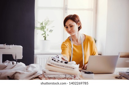 Young Creative Woman In A Studio, Startup Of Small Tailoring Business.