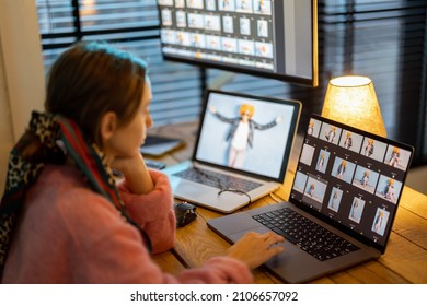 Young creative woman work on laptop and desktop computers editing photos at cozy home office. Portrait of female photographer at home workplace - Powered by Shutterstock