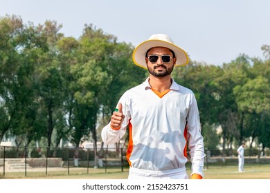 young cricketer on match ground - Powered by Shutterstock