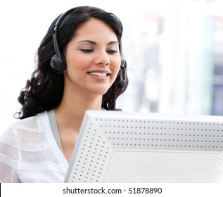 Young customer service representative working in a call center - Shutterstock ID 51878890