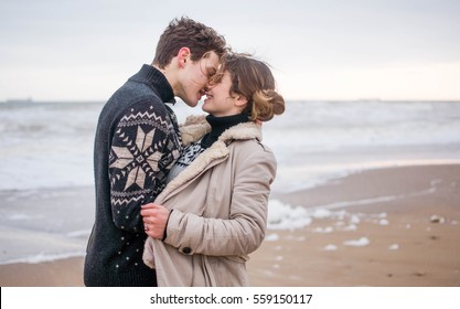  Young Cute Couple At Sea In Winter	