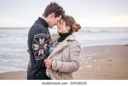  Young Cute Couple At Sea In Winter	