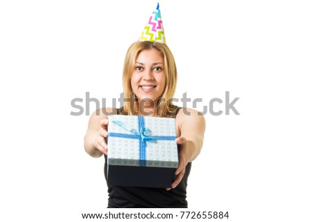 Young cute smiling blonde girl with blue gift box in hands on white background
