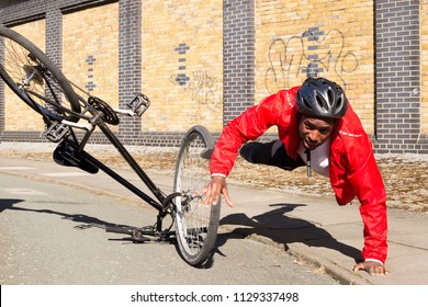 Young Cyclist Having An Accident On His Bike