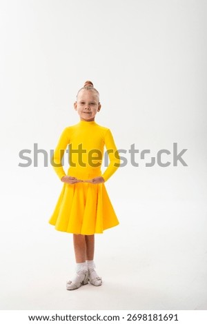Young dancer with cochlear implant performing dance pose. Strength, adaptability, and inclusion merge in a story of overcoming hearing barriers through art, discipline, and body control.