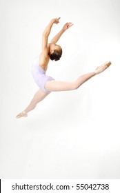 Young Dancer Leaping Through The Air