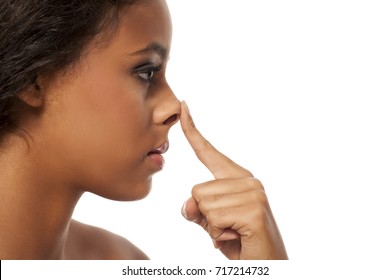 Young Dark Skinned Woman Touching Her Nose