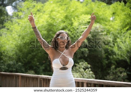 Similar – Brunette surfer woman with top holding surfboard