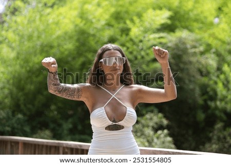 Similar – Brunette surfer woman with top holding surfboard