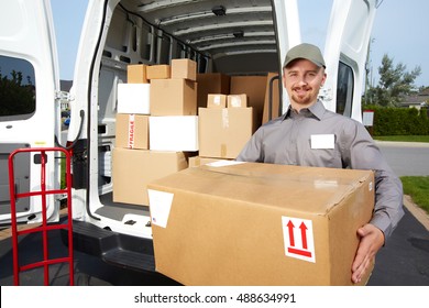 Young Delivery Man Parcel Stock Photo 488634991 | Shutterstock
