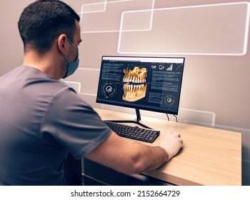 Jeune dentiste examinant une radiographie sur ordinateur dans une clinique dentaire