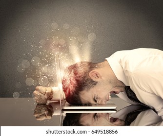 A Young Depressed Business Person Laying His Head On Computer Keyboard With Thoughts Exploding From His Head Illustrated By Light Beams Concept