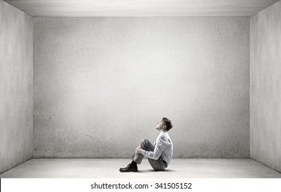 young-depressed-businessman-sitting-on-260nw-341505152.jpg